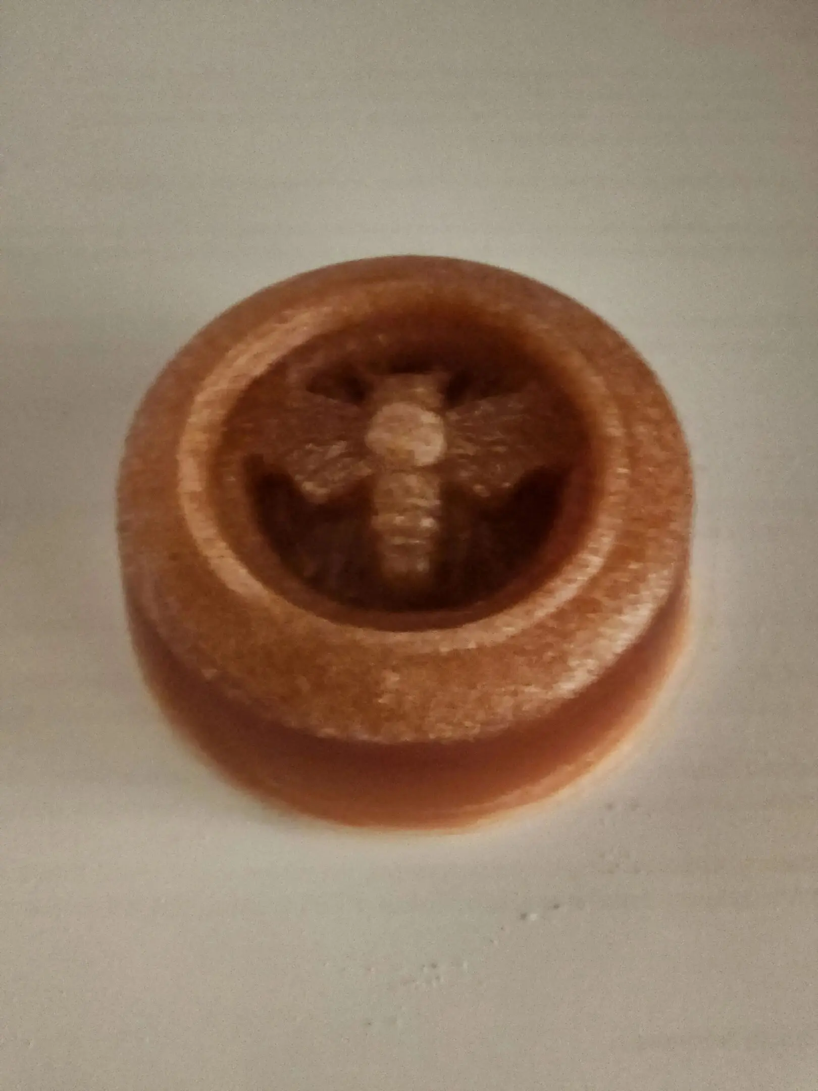 A close up of the top of a candle
