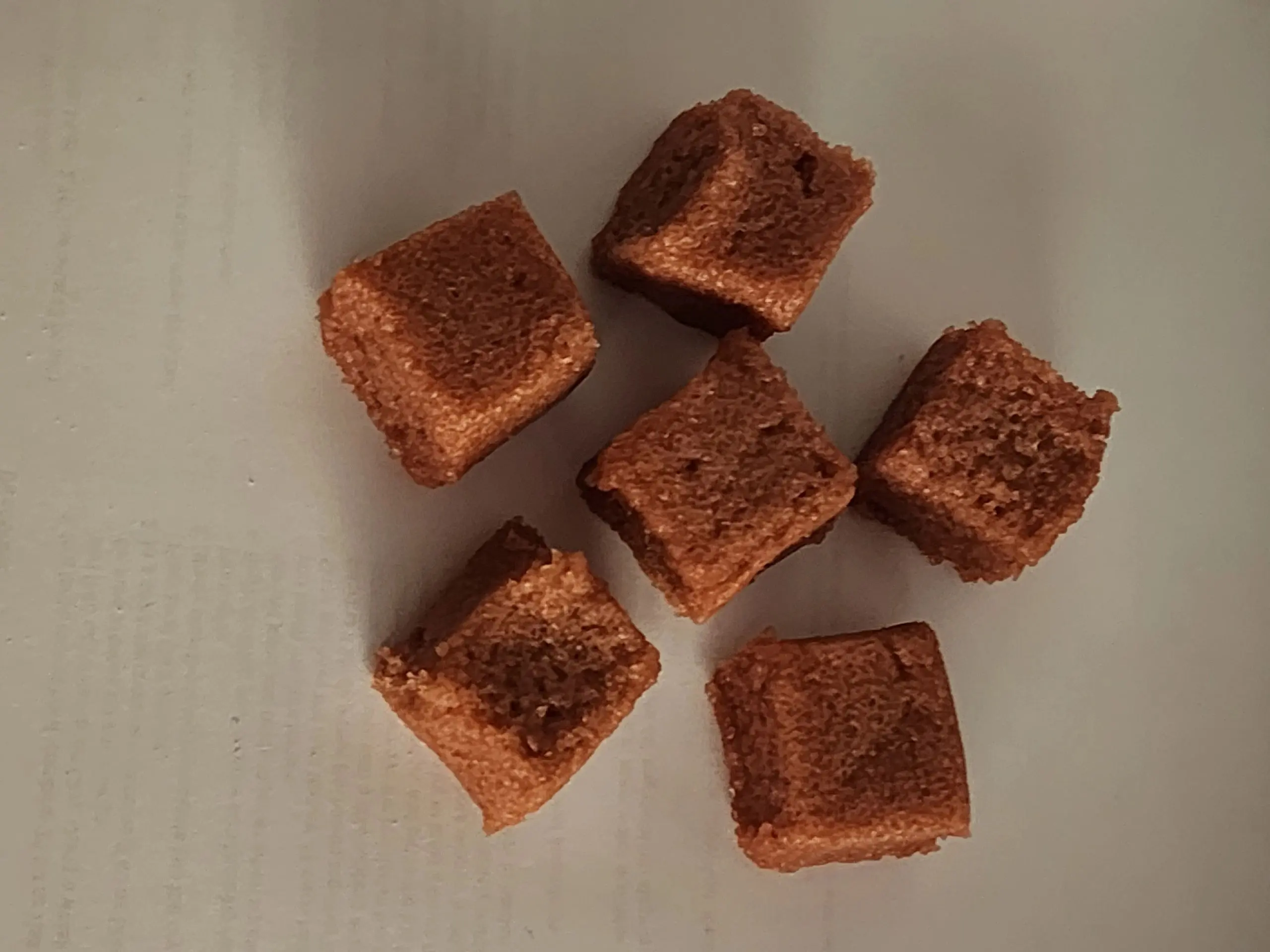 A bunch of brown cubes are on the table