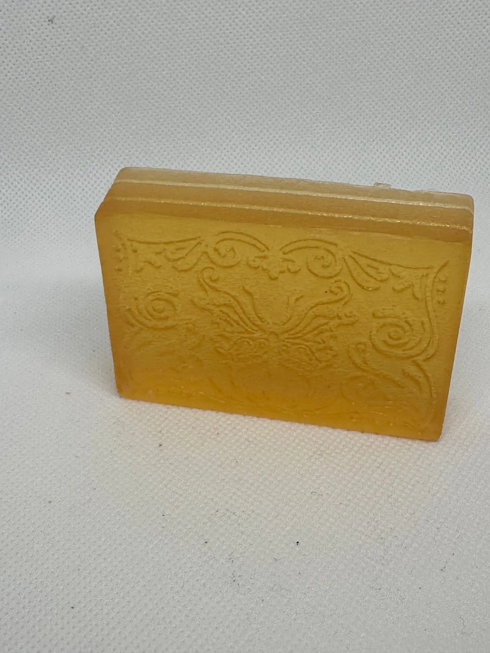 IMG_0406-abda6ee A yellow soap sitting on top of a counter.