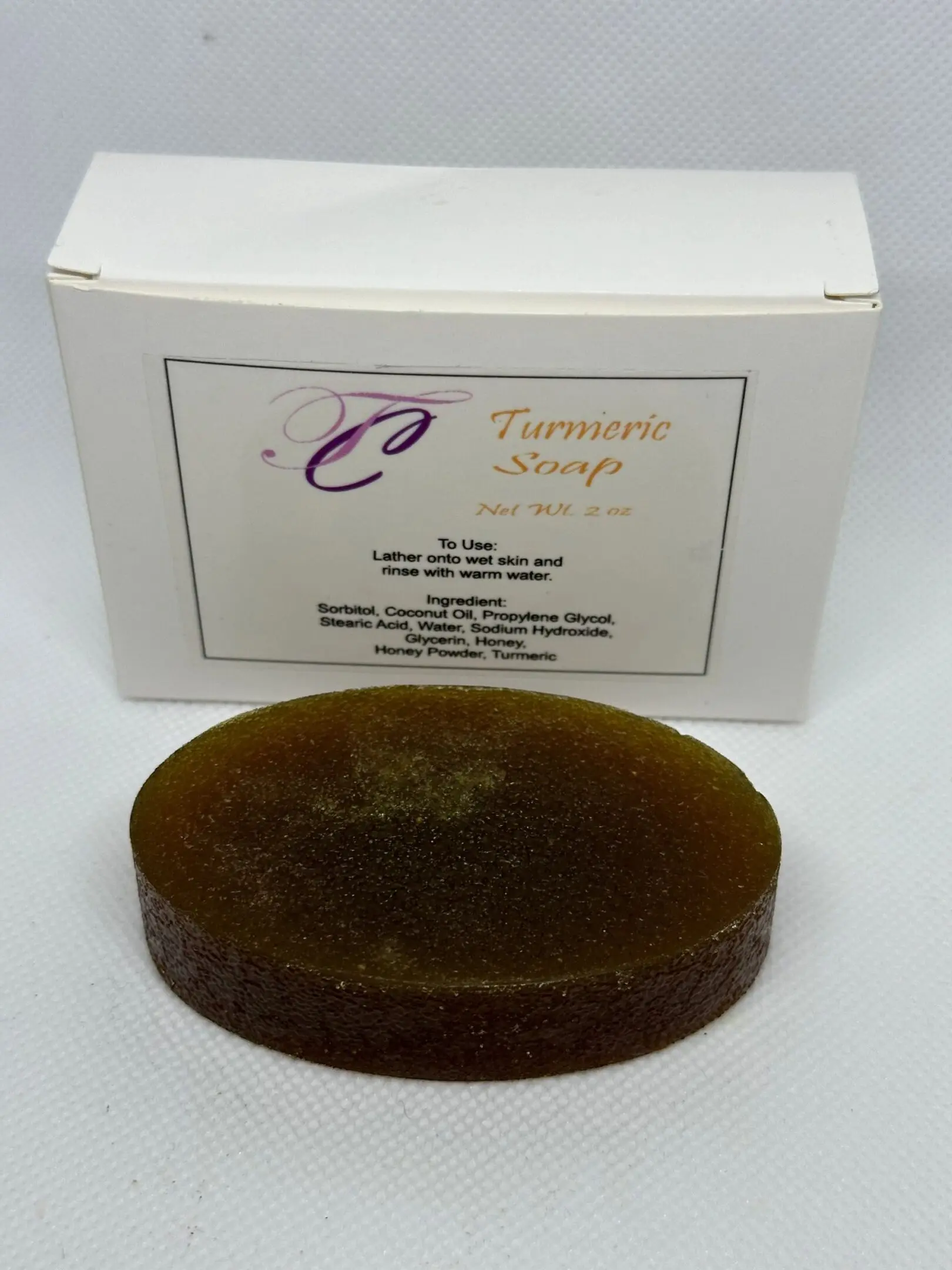 A box of soap with a brown wax seal.