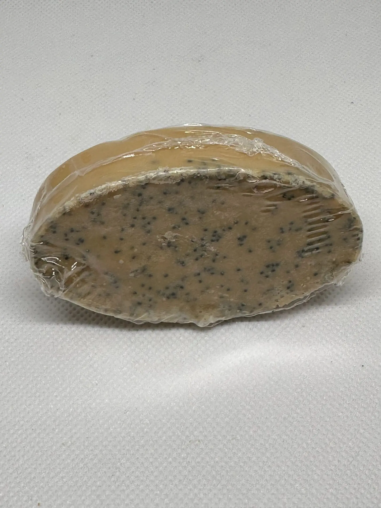 A piece of soap sitting on top of a table.