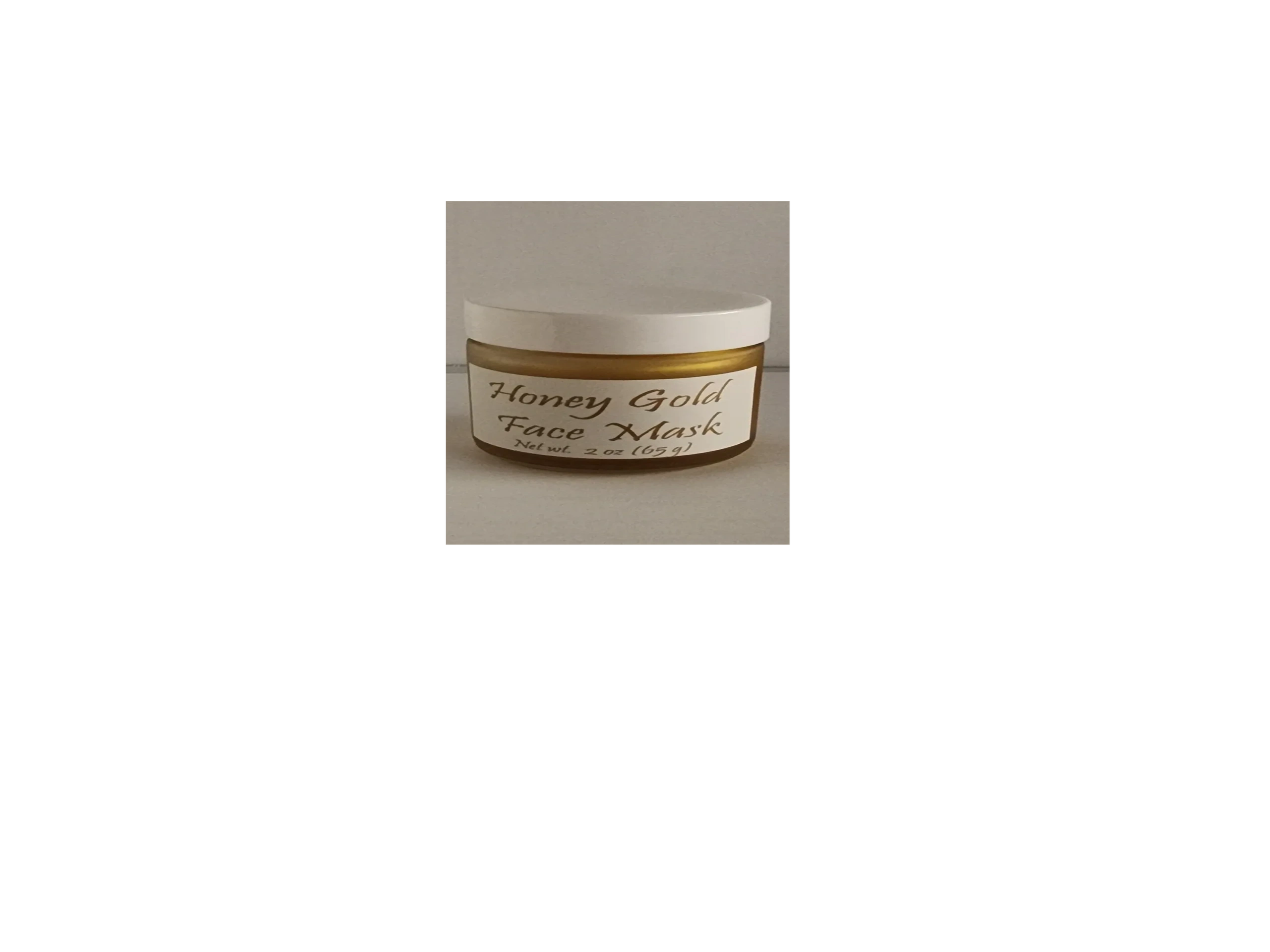 blob-3eeb74b A green container of cosmetic product with white label.