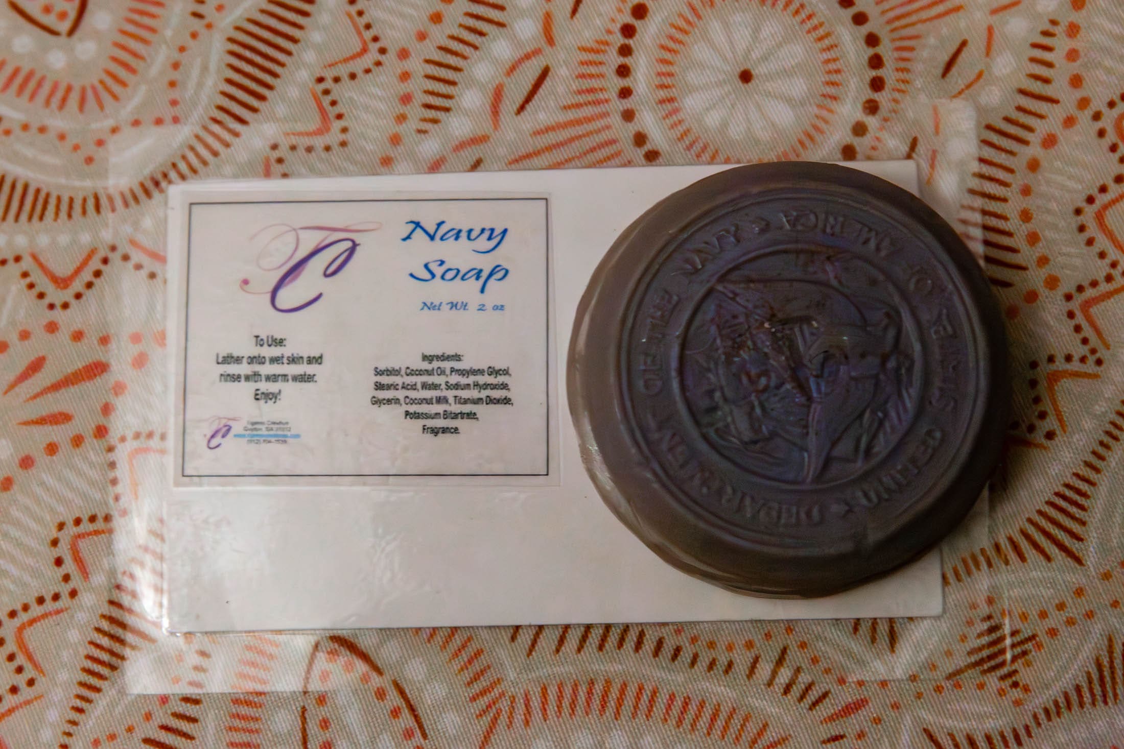 Navy soap on patterned surface.